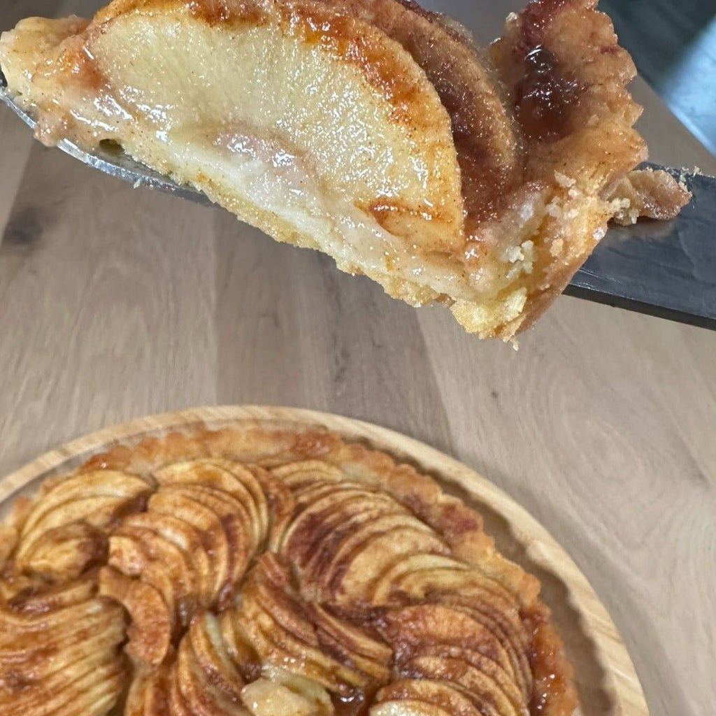 Apple Sourdough Tart – SEBAlicious™ Artisan Dessert (Des Plaines, IL) - Artisan Real Sourdough Bread Chef SebaArtisan Real Sourdough Bread Chef SebaArtisan Real Sourdough Bread Chef SebaSEBA-DS-ASTSlice of artisan apple tart showing soft baked apple filling and flaky buttery crust by Chef SEBA