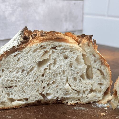 Asiago Cheese & Caramelized Onion Sourdough Bread – Chef SEBA Artisan Loaf - Artisan Real Sourdough Bread Chef SebaArtisan Real Sourdough Bread Chef SebaArtisan Real Sourdough Bread Chef SebaSEBA-BRD-ASI-ONI-WHLASIAGO-ONION-01Whole LoafSliced Asiago onion sourdough bread showing soft airy crumb and cheese pockets