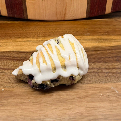 Blueberry Lemon Sourdough Scone – Chef SEBA Artisan Bakery Treat - Artisan Real Sourdough Bread Chef SebaArtisan Real Sourdough Bread Chef SebaArtisan Real Sourdough Bread Chef SebaSEBA-SCO-BLS-001BLUE-SCONE-01singleBlueberry lemon sourdough scone close - up by Chef SEBA, fresh baked artisan pastry in Des Plaines Illinois