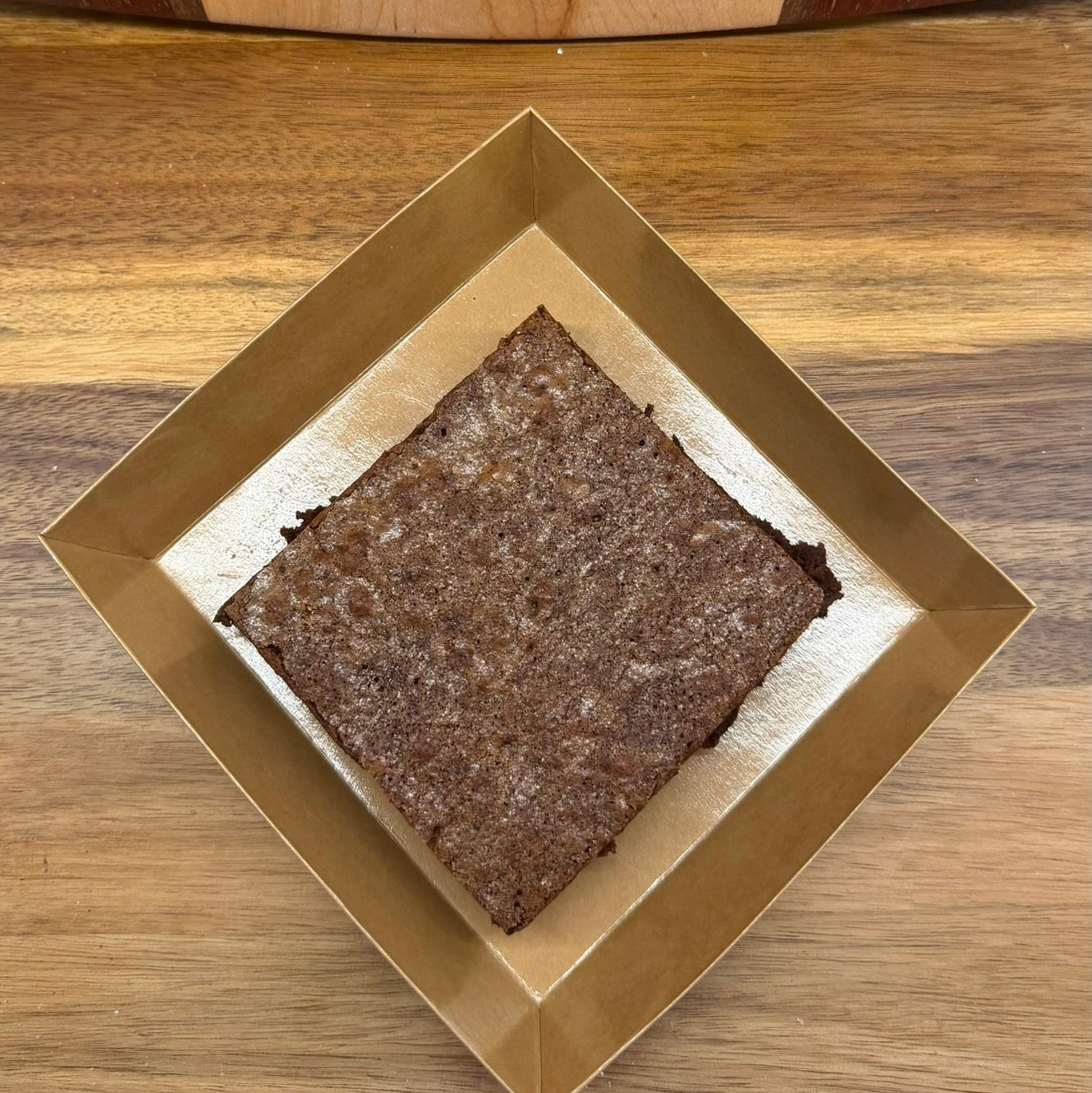 Top view of chocolate chip sourdough brownie by Chef SEBA – fudgy artisan brownie with crackled top baked fresh in Des Plaines Illinois