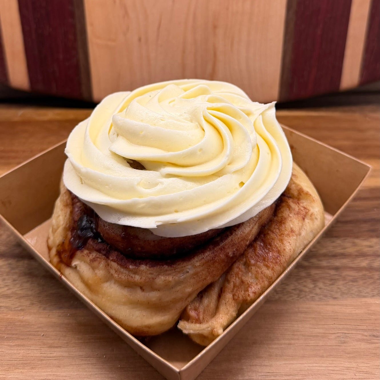 Cinnamon Sourdough Rolls | Artisan Sweet Rolls by Chef SEBA - Artisan Real Sourdough Bread Chef SebaArtisan Real Sourdough Bread Chef SebaArtisan Real Sourdough Bread Chef SebaSEBA-CIN-ROLL-1SEBA-CIN-ROLLsingleClose - up artisan sourdough cinnamon roll with thick cream cheese frosting by Chef SEBA bakery