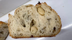 Garlic Rosemary Sourdough Bread – Chef SEBA Artisan Loaf (Savory, Naturally Fermented) - Artisan Real Sourdough Bread Chef SebaArtisan Real Sourdough Bread Chef SebaArtisan Real Sourdough Bread Chef SebaSEBA-FB-GRWhole Loafsliced garlic rosemary sourdough bread ready to serve with crispy crust and soft interior