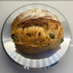 Green Olive Artisan Sourdough Bread – Chef SEBA Organic Vegan Loaf (Mediterranean Style, Naturally Fermented) - Artisan Real Sourdough Bread Chef SebaArtisan Real Sourdough Bread Chef SebaArtisan Real Sourdough Bread Chef SebaSEBA-BRD-OLV-WHLMED-ROLL-01Whole LoafSliced green olive sourdough bread ready to serve with soft interior and artisan crust