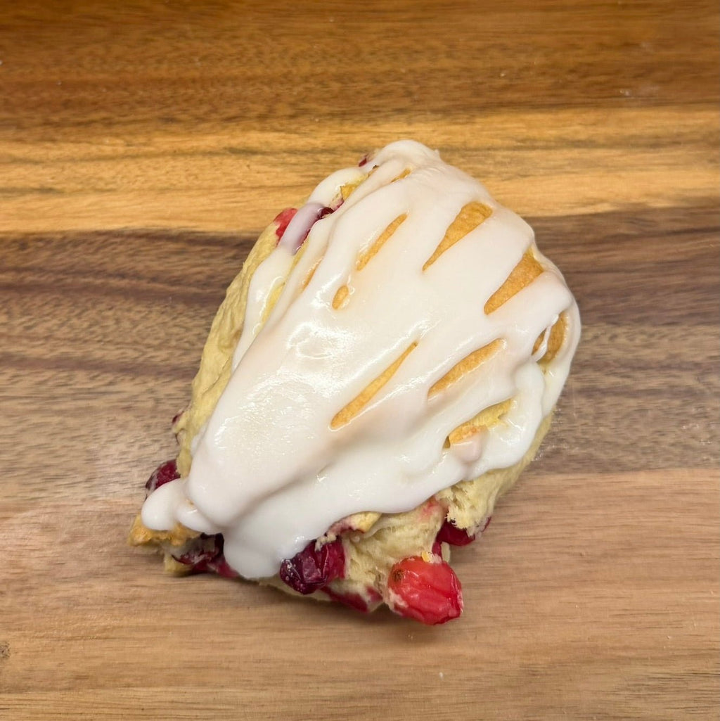 Organic Cranberry Lemon Sourdough Scones – Chef SEBA Artisan Bakery - Artisan Real Sourdough Bread Chef SebaArtisan Real Sourdough Bread Chef SebaArtisan Real Sourdough Bread Chef SebaSEBA-SCON-CRAN-LEM-0011singleGlazed cranberry lemon sourdough scone by Chef SEBA fresh baked artisan pastry on wooden board