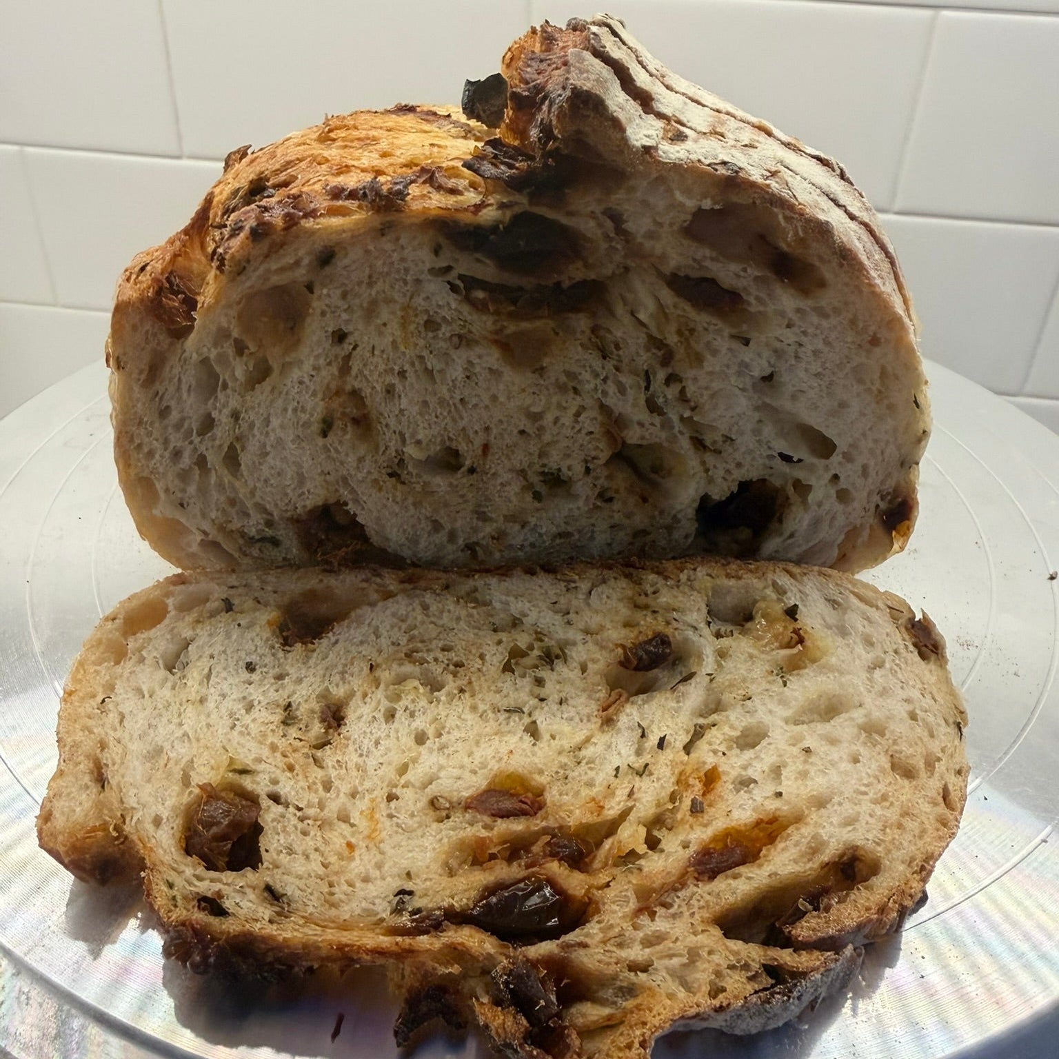 Organic Sun - Dried Tomato & Kerrygold Dubliner Sourdough Bread – Chef SEBA Artisan Mediterranean Loaf - Artisan Real Sourdough Bread Chef SebaArtisan Real Sourdough Bread Chef SebaArtisan Real Sourdough Bread Chef SebaSEBA-BRD-SDT-DUB-WHLORIG-SOUR-01Whole LoafSliced artisan sourdough bread with sun dried tomatoes and Kerrygold Dubliner cheese perfect for sandwiches