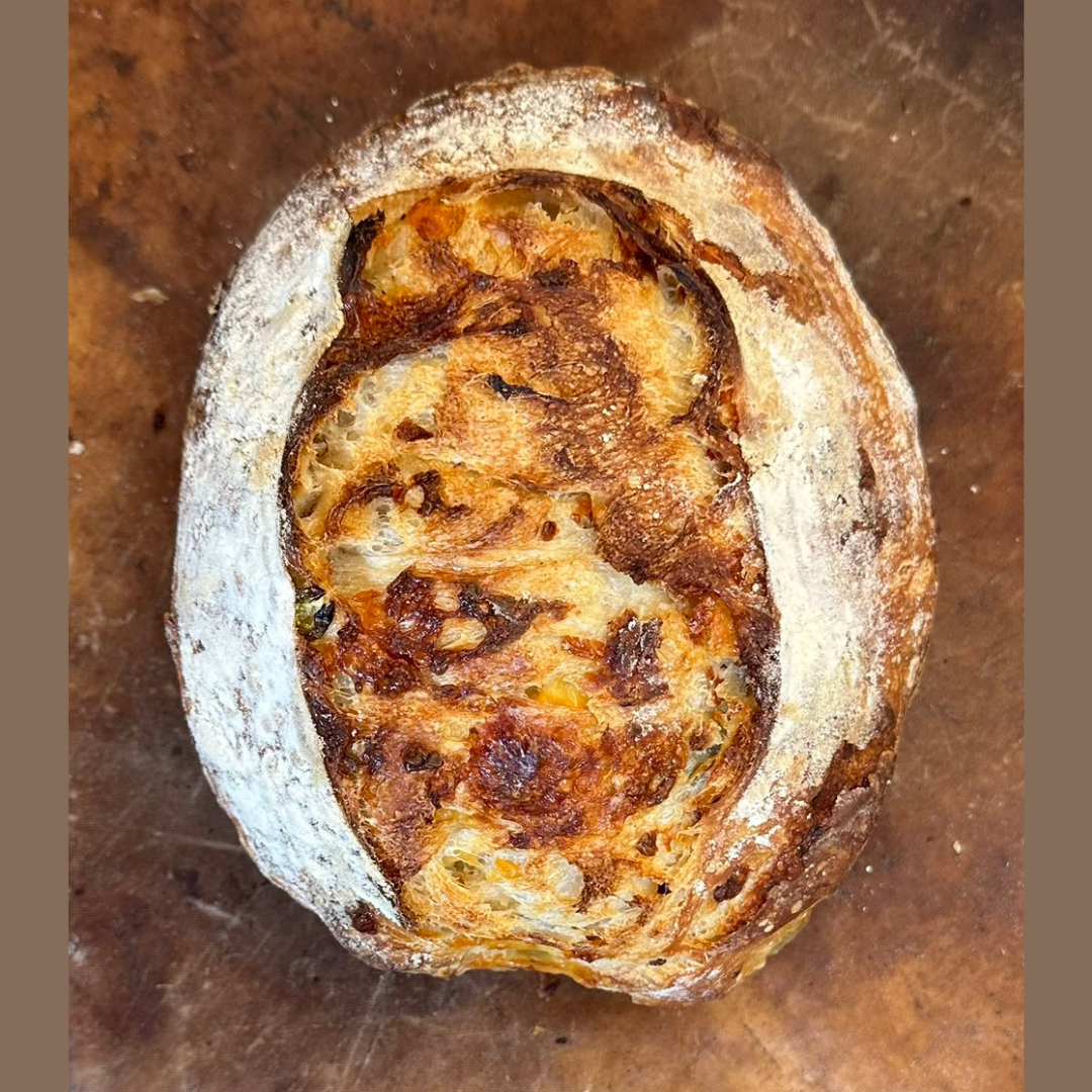 Parmesan Italian Seasoning sourdough bread by Chef SEBA with savory herb and cheese crust
Fresh baked Parmesan herb artisan sourdough loaf by Chef SEBA in Des Plaines Illinois
