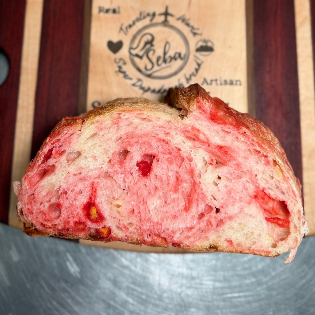 SEBAlicious™ Flamin’ Hot Cheetos Extra Sharp Cheddar Sourdough Bread - Artisan Real Sourdough Bread Chef SebaArtisan Real Sourdough Bread Chef SebaArtisan Real Sourdough Bread Chef SebaWhole Loafnterior crumb of spicy Flamin Hot cheddar sourdough artisan loaf
