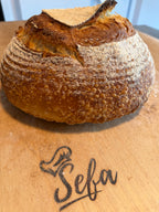 Two handcrafted Polish wedding sourdough loaves prepared for a traditional wedding celebration